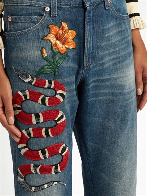 snake jeans gucci.